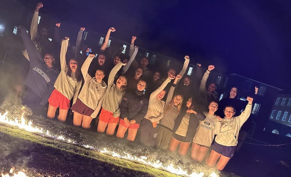 St Swithun’s students walk fire to raise funds for charity